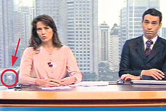 Balão do "Pânico na TV", parabenizando Chico Pinheiro, aparece durante o "SPTV - 1ª edição" desta sexta-feira, na Globo
