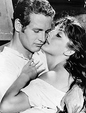 Actor Paul Newman is shown in a scene from the 1958 film "The Left Handed Gun" with actress Lita Milan in this undated file photograph. Legendary film star Newman, whose brilliant blue eyes, good looks and talent made him one of Hollywood's top actors over six decades, has died, a spokesman said on September 27, 2008. He was 83 and had been battling cancer. REUTERS/Warner Bros/Handout (UNITED STATES). NO SALES. NO ARCHIVES. FOR EDITORIAL USE ONLY. NOT FOR SALE FOR MARKETING OR ADVERTISING CAMPAIGNS.