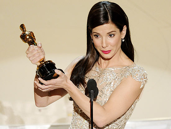 Sandra Bullock accepts the Oscar for best performance by an actress in a leading role for "The Blind Side" at the 82nd Academy Awards Sunday, March 7, 2010, in the Hollywood section of Los Angeles. (AP Photo/Mark J. Terrill)