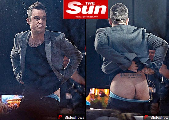 Cantor Robbie Williams abaixo a cala em programa de televiso da Dinamarca por um desafio de R$ 50