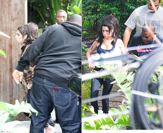 Amy Winehouse passeia com seguranas pelo hotel de luxo Santa Tereza, no Rio