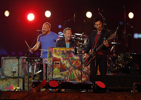 Will Champion, Chris Martin e Guy Berryman, do Coldplay, no encerramento dos Jogos Paralímpicos em Londres