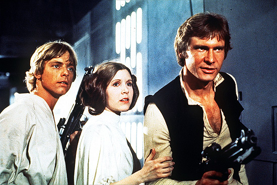 Os atores Mark Hamill (esq.), Harrison Ford e Carrie Fisher 