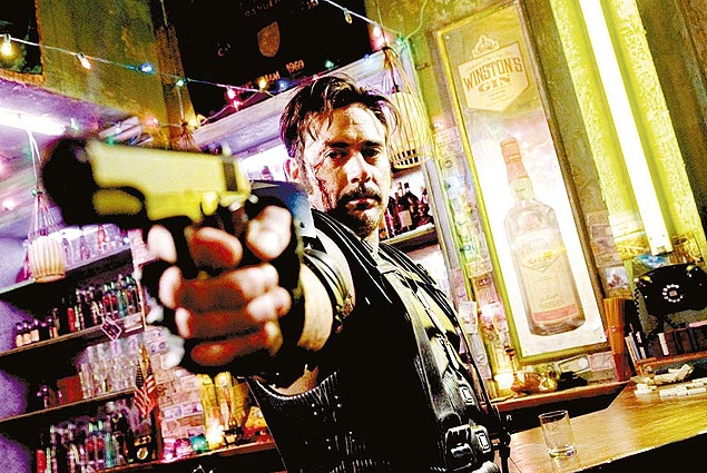O ator Jeffrey Dean Morgan em cena de "Watchmen ", do diretor americano Zack Snyder, uma adaptação da HQ de mesmo nome