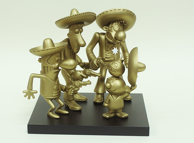 Trofu do 25 HQMix, que retrata "Los Trs Amigos", personagens criados pelos homenageados Angeli, Glauco e Laerte 