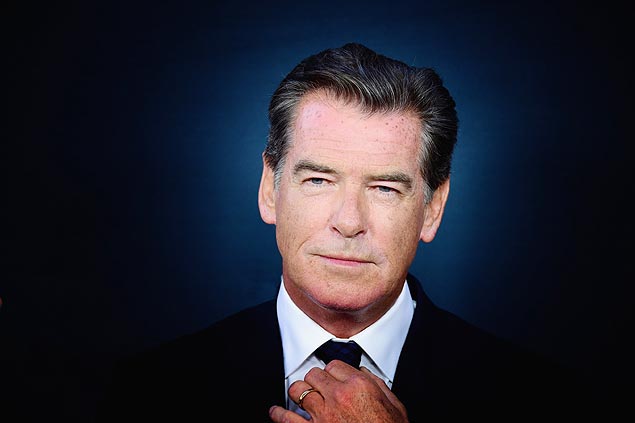 LOS ANGELES, CA - AUGUST 17: (EDITORS NOTE: Image has been process using digital filters). Actor Pierce Brosnan arrives at The Premiere Of The Weinstein Company's "No Escape" at Regal Cinemas L.A. Live on August 17, 2015 in Los Angeles, California. Frazer Harrison/Getty Images/AFP == FOR NEWSPAPERS, INTERNET, TELCOS & TELEVISION USE ONLY ==