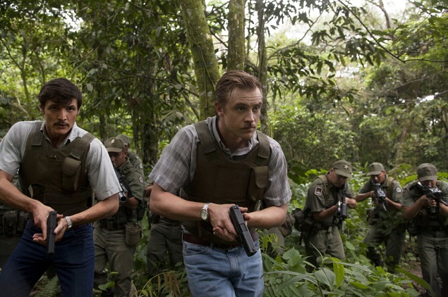 This undated production photo provided by Netflix, shows actors Pedro Pascal, left, as Javier Pena, and Boyd Holbrook as Steve Murphy in the Netflix Original Series "Narcos." The series that debuts on Aug. 28, 2015, is based on the account of Murphy and Pena, now-retired Drug Enforcement Administration agents who were assigned to bring the drug lord down. (Daniel Daza/Netflix via AP)