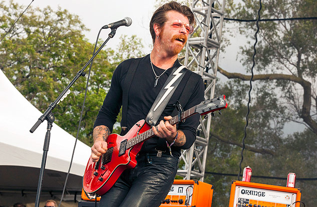 FILE - In this Sept. 11, 2015 file photo, Jesse Hughes of Eagles of Death Metal performs at Riot Fest & Carnival in Douglas Park in Chicago. Hughes was scheduled to perform, Friday, Nov. 13, 2015, with the band at the Bataclan concert hall in Paris where patrons were taken hostage. (Photo by Barry Brecheisen/Invision/AP, File) ORG XMIT: NYET532