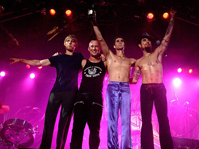 ORG XMIT: 383901_1.tif Members of the rock band "Jane's Addiction," (L-R) Chris Chaney, Stephen Perkins, Perry Farrel and Dave Navarro, are shown on stage in this undated publicity photograph. The group is currently headlining the premier rock concert tour of the summer, Lollapalooza and is set to release its first album in 13 years titled "Strays." NO SALES REUTERS/Fernanda Hermanny/Capitol Records/Handout/ FEATURE-LEISURE-JANES 