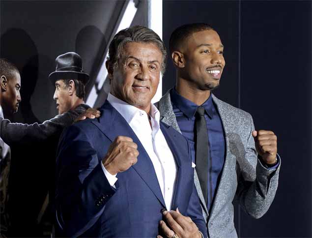 Cast members Sylvester Stallone (L) and Michael B. Jordan pose during the premiere of the film "Creed" in Los Angeles, California, in this November 19, 2015 file photo. The film is the seventh in the "Rocky" series, which long focused on a gritty, declining Philadelphia, which like many major U.S. cities was hurt by the loss of its industrial base. To match story FILM-CREED/ REUTERS/Kevork Djansezian/Files ORG XMIT: TOR307