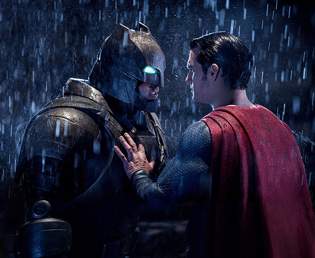 This image released by Warner Bros. Entertainment shows Ben Affleck as Batman, left, and Henry Cavill as Superman in a scene from, 