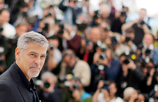 Cast member George Clooney poses during a photocall for the film 
