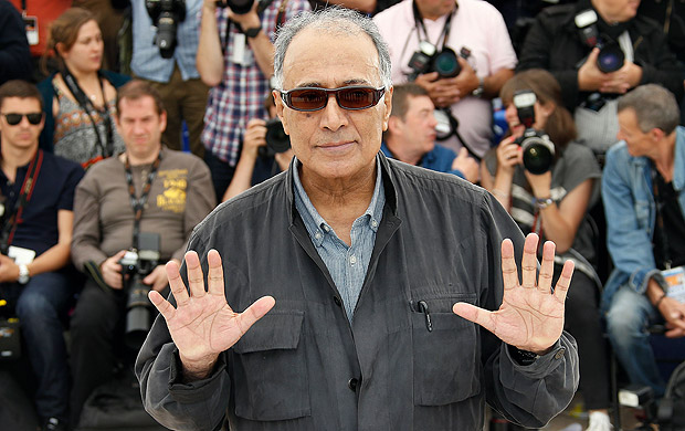 Iranian director and President of the Cinefondation Jury Abbas Kiarostami poses during a photocall of "The Cinefondation Jury" at the 67th edition of the Cannes Film Festival in Cannes, southern France, on May 22, 2014. AFP PHOTO / VALERY HACHE ORG XMIT: CAN6378