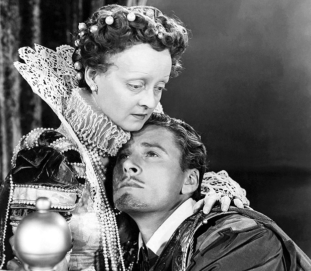 Bette Davis e Errol Flynn em cena de 'Meu Reino por um Amor