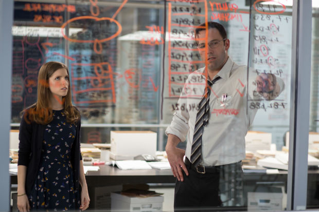 In this image released by Warner Bros. Pictures shows Anna Kendrick, left, and Ben Affleck in a scene from, "The Accountant," in theaters on October 14. (Chuck Zlotnick/Warner Bros. Pictures via AP) ORG XMIT: NYET953