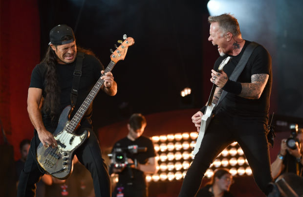 Musicians Robert Trujillo, left, and James Hetfield of Metallica perform at the 2016 Global Citizen Festival in Central Park on Saturday, Sept. 24, 2016, in New York. (Photo by Evan Agostini/Invision/AP) ORG XMIT: NYEA141