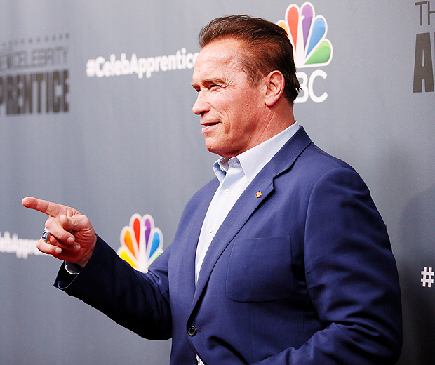 Host Arnold Schwarzenegger poses after a panel for "The New Celebrity Apprentice" in Universal City, California, December 9, 2016. REUTERS/Danny Moloshok ORG XMIT: DLM216