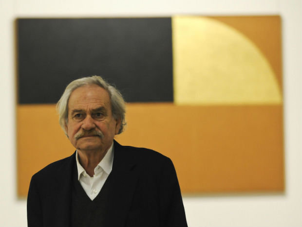 FILE -- In this March 11 2015 file photo Jannis Kounellis poses for pictures in Citta' di Castello, Italy. Greek artist Jannis Kounellis, a major exponent of Arte Povera who made Italy his adopted home, has died in Rome at the age of 80. (Crocchioni/ANSA via AP) ORG XMIT: ANS102