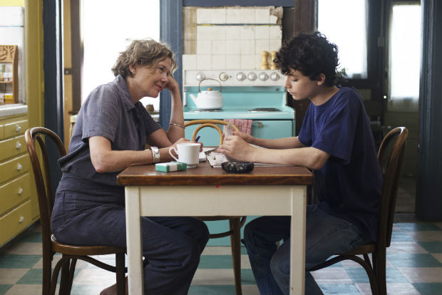 This image released by A24 shows Annette Bening, left, and Lucas Zade Zumann in "20th Century Women." (Merrick Morton/A24 via AP) ORG XMIT: NYET523