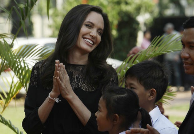 Hollywood actress Angelina Jolie smiles before a press conference in Siem Reap province, Cambodia, Saturday, Feb. 18, 2017. Jolie on Saturday launches her two-day film screening of 