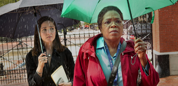 This image released by HBO shows Rose Byrne, left, and Oprah Winfrey in a scene from HBO film 