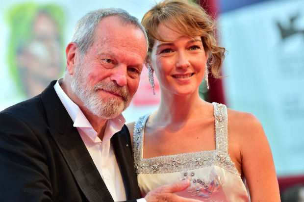 Cristiana Capotondi and director Terry Gilliam arrive for the screening of their movie 