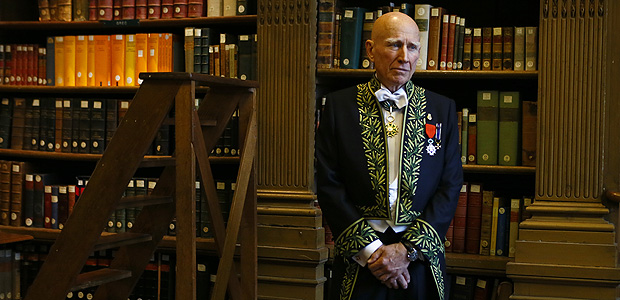 Photographer Sebastiao Salgado poses as he was elected in the French Academy of Fine Arts (Academie des Beaux-Arts) during a ceremony in Paris, France, Wednesday, Dec. 6, 2017. The Academy of Fine Arts concerning Paintings, Sculpture Music, Architecture and Photography is part of the French Academy, concerning the French language, the Academy of Humanities, the French Academy of Sciences and the Academy of Moral and Political Sciences. (AP Photo/Francois Mori) ORG XMIT: ZFM109