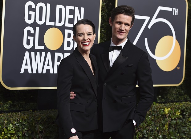 Claire Foy, left, and Matt Smith arrive at the 75th annual Golden Globe Awards at the Beverly Hilton Hotel on Sunday, Jan. 7, 2018, in Beverly Hills, Calif. (Photo by Jordan Strauss/Invision/AP) ORG XMIT: CAPM208