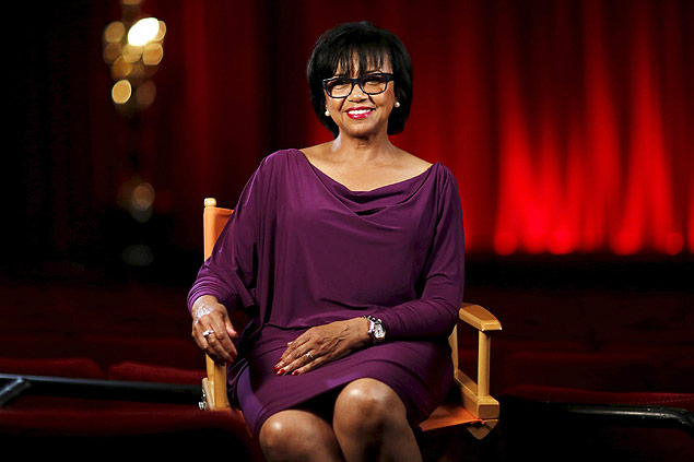 Academy President Cheryl Boone Isaacs poses for a portrait inside the The Samuel Goldwyn theatre at the Academy of Motion Picture Arts and Sciences in Beverly Hills, California in this February 19, 2014 file photo. The Academy of Motion Picture Arts and Sciences, organizer of the Oscar awards, pledged on January 22, 2016 to double its membership of women and minorities by 2020 through an ambitious affirmative action plan that includes stripping some older members of voting privileges. Boone Isaacs, who became the first African-American to assume the organization's top post in the summer of 2013, hailed Friday's move as demonstrating the academy is ready 