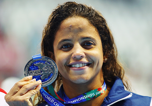 Etiene Medeiros poses with her silver medal after the women's 50m backstroke final at the Aquatics World Championships