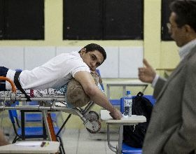 Wounded and with a Bullet in His Back, Brazilian Medicine Student Attends Classes in Hospital Bed