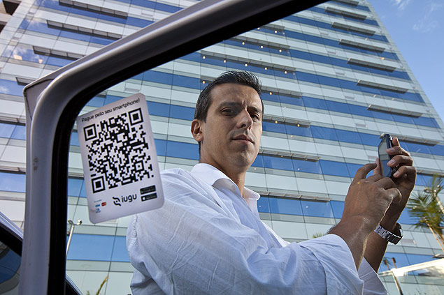 Marcello Macedo, 37, taxista, utiliza o aplicativo Iugu, que faz o pagamento atravs do smartphone do cliente conectado ao seu por meio de cdigo QR