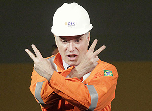 Brazilian millionaire Eike Batista, CEO of EBX Group, gestures to the audience during a ceremony in celebration of the start of oil production of OGX, his oil and gas company.