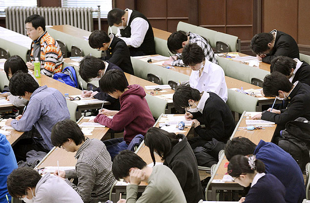 In this January 2013 photo, preparatory students sit for National Center Test for University Admissions at the University of Tokyo. Students from Shanghai, Hong Kong, Singapore, Taiwan, Japan and South Korea were among the highest-ranking groups in math, science and reading in test results released Tuesday, Dec. 3, 2013 by the Program for International Student Assessment (PISA) coordinated by the Paris-based Organization for Economic Cooperation and Development (OECD). The group tests students worldwide every three years. In Japan, the government added 1,200 pages to elementary school textbooks after its children fell behind in those in rivals such as South Korea and Hong Kong in 2009, although Japan's scores for 2009 were tops for rich industrialized countries. Japan has since improved its standings in all three areas. (AP Photo/Kyodo News) JAPAN OUT, CREDIT MANDATORY ORG XMIT: TOK403