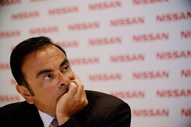 The President and CEO of Japan's auto company Nissan Carlos Ghosn, gestures during a press conference in Rio de Janeiro, Brazil, on January 6, 2015, where he announced that Nissan wants 5 percent (currently 2.5 percent) of the Brazilian market until the end of 2016. AFP PHOTO / YASUYOSHI CHIBA ORG XMIT: YCH050