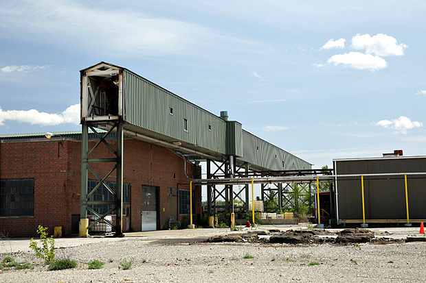 Part of an old auto factory on a 335 acre site, once a famed bomber factory in World War II and then G.M.'s former Willow Run plant, in Ypsilanti, Mich., May 16, 2016. The University of Michigan is a partner with automakers in a project to develop the site, to be called the American Center for Mobility, for testing autonomous cars at highway speeds, and in more complex situations. (Fabrizio Costantini/The New York Times)