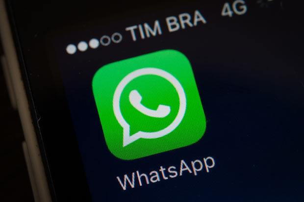 A screen shot of the popular WhatsApp smartphone application is seen after a court in Brazil ordered cellular service providers nationwide to block the application for two days in Rio de Janeiro, Brazil, on December 17, 2015. The unprecedented 48-hour blockage was to implement a Sao Paulo state court order and was to take effect at 0200 GMT Thursday, although it was not immediately clear if service providers would acquiesce to the order.The court said WhatsApp had been asked several times to cooperate in a criminal investigation, but had repeatedly failed to comply. AFP PHOTO / YASUYOSHI CHIBA ORG XMIT: YCH098