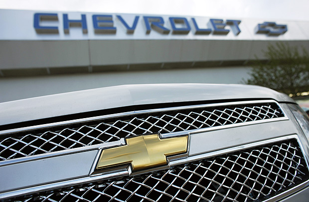 ORG XMIT: 470201_1.tif In this April 11, 2010 photo the Chevrolet logo shines of the grille of a 2010 Tahoe at a Chevrolet dealership in Aurora, Colo. General Motors Co.'s sales rose 6.4 percent in April as the auto industry continued to see signs of recovery, although the pace slowed from incentive-fueled March. (AP Photo/David Zalubowski) 