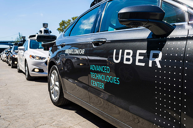 Pilot models of the Uber self-driving car is displayed at the Uber Advanced Technologies Center on September 13, 2016 in Pittsburgh, Pennsylvania. Uber launched a groundbreaking driverless car service, stealing ahead of Detroit auto giants and Silicon Valley rivals with technology that could revolutionize transportation. / AFP PHOTO / Angelo Merendino