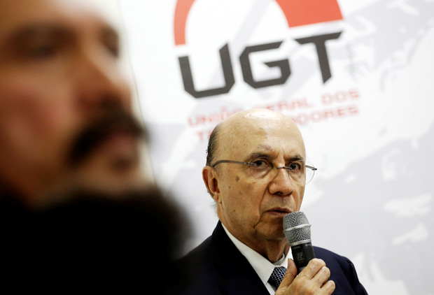 Brazil's Finance Minister Henrique Meirelles talks with members of the General Workers Union (UGT) in Sao Paulo, Brazil, December 6, 2016. REUTERS/Nacho Doce ORG XMIT: NAC02