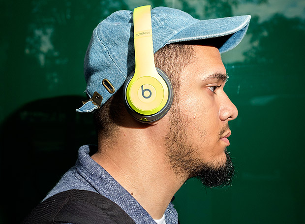 -- PHOTO MOVED IN ADVANCE AND NOT FOR USE - ONLINE OR IN PRINT - BEFORE DEC. 11, 2016. -- Jason Small listens to music on his Beats headphones near Columbus Circle in Manhattan, Oct. 17, 2016. Headphones have given privacy-seeking city dwellers the ability to largely avoid an experience that was once arguably the whole point of living in the crowd 