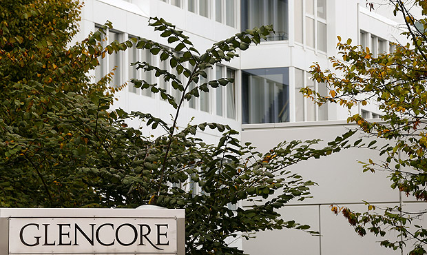 FILE PHOTO: The logo of commodities trader Glencore is pictured in front of the company's headquarters in Baar, Switzerland, September 30, 2015. REUTERS/Arnd Wiegmann/File Photo ORG XMIT: SMN513
