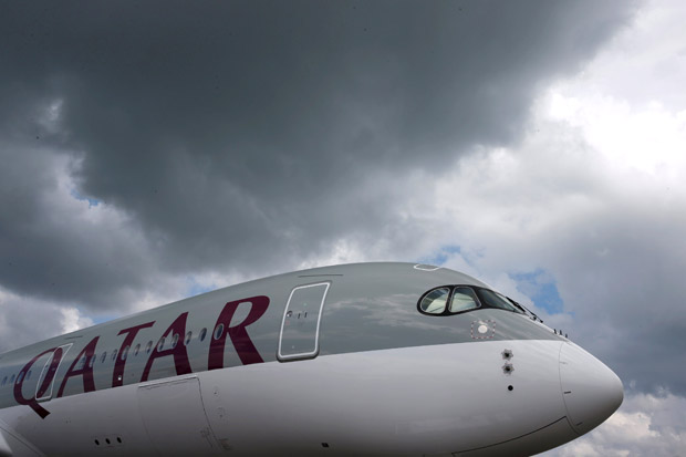 FILE PHOTO: A Qatar Airways Airbus A350 XWB aircraft is displayed at the Singapore Airshow at Changi Exhibition Center February 18, 2016. REUTERS/Edgar Su/File Photo ORG XMIT: SMN506