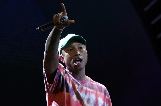 Pharrell Williams performs during a concert against the G20 summit in Hamburg, northern Germany on July 6, 2017. Leaders of the world's top economies will gather from July 7 to 8, 2017 in Germany for likely the stormiest G20 summit in years, with disagreements ranging from wars to climate change and global trade. / AFP PHOTO / RONNY HARTMANN