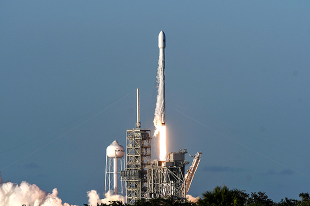 A SpaceX Falcon 9 rocket lifts off from Kennedy Space Center in Cape Canaveral, Fla., Wednesday, July 5, 2017. SpaceX launched an Intelsat satellite on the third try on Wednesday. (Craig Bailey /Florida Today via AP) ORG XMIT: FLROC201