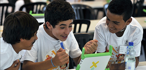 ORG XMIT: PP012 Schoolchildren compete in the first Mathematics Marathon of the "Ceibal Project", on November 29, 2011 in Montevideo. The Ceibal Project is the Uruguayan equivalent to the 'One Laptop per Child' project, through which every public primary schoolchild is equipped for free with a personal computer and free access to an educational net. AFP PHOTO/Pablo PORCIUNCULA