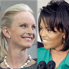  Cindy McCain, left, looks at her husband Republican presidential candidate Sen. John McCain, R-Ariz., during a town hall meeting at the National Constitution Center in Philadelphia, Pa., Wednesday, June 11, 2008. (AP Photo/LM Otero) /// Democratic presidential candidate Sen. Barack Obama D-Ill., is introduced by his wife Michelle Obama, Friday, June 13,2008, prior to speaking at the Oakleaf Village retirement community in Columbus, Ohio. (AP Photo/Alex Brandon)