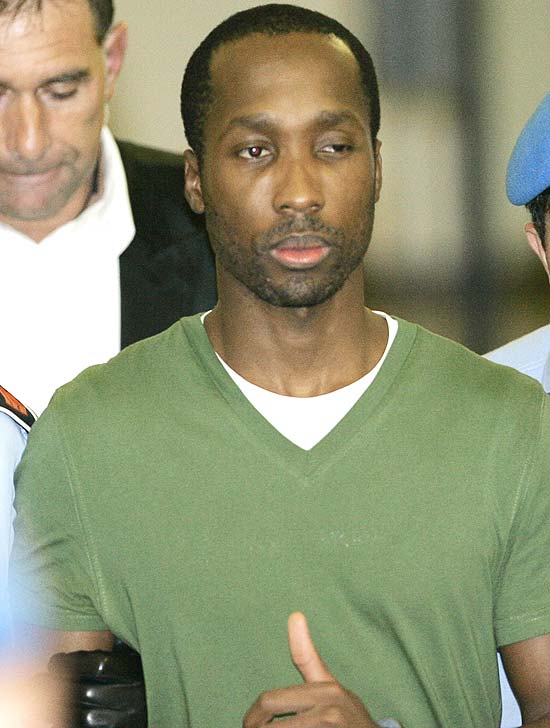 Rudy Hermann Guede  escoltado de volta  priso aps audincia; corte manteve sentena por assassinato 
