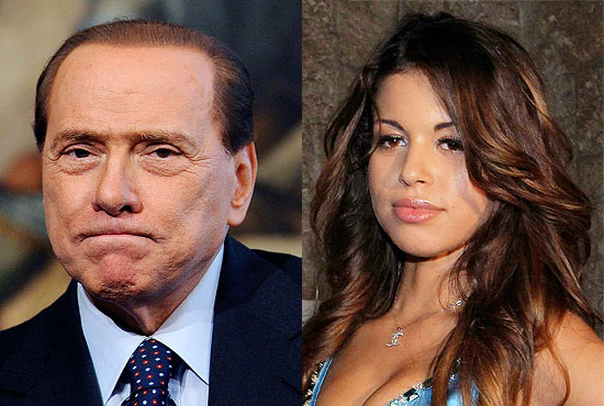 Berlusconi ao lado da danarina Ruby; premi ganha apoio do Parlamento um dia antes de julgamento