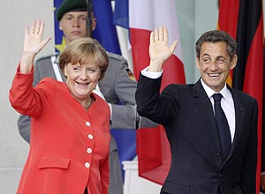 Nicolas Sarkozy e Angela Merkel exigem participao privada voluntria no plano de resgate  Grcia